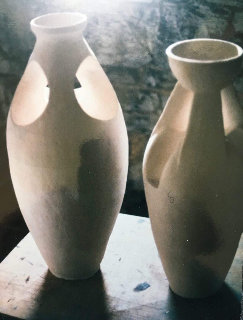 A pair of white sculptures